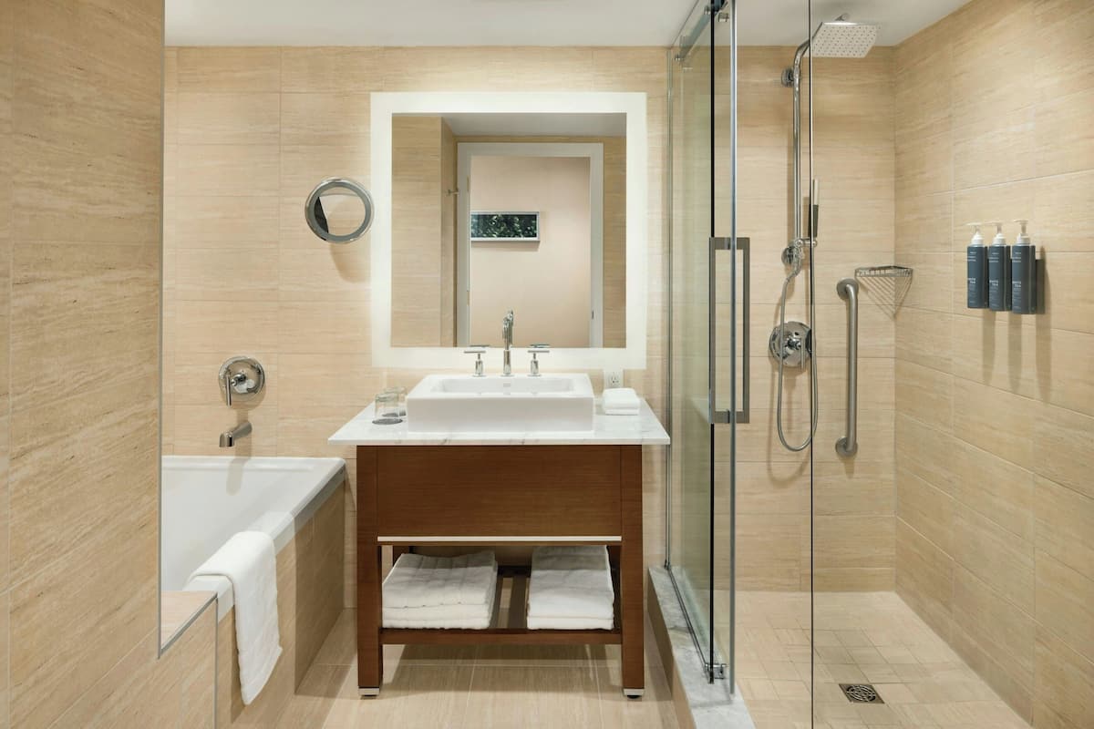 separate bathtub and shower, deep-soaking bathtub, free toiletries