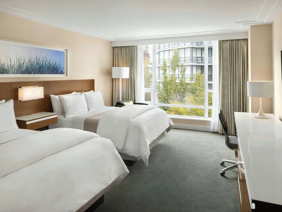 Premium bedding, pillow-top beds, in-room safe, desk