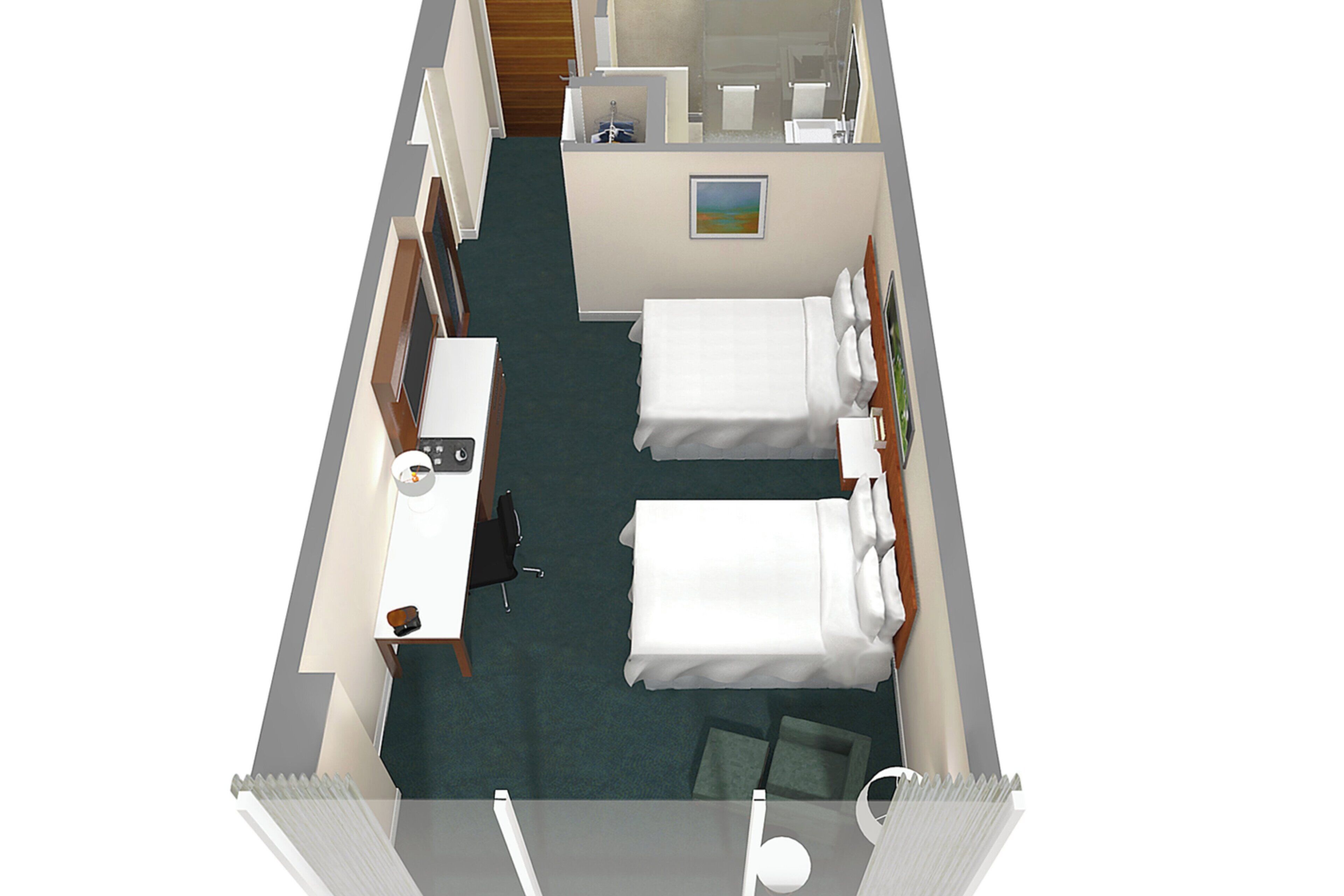 A hotel room with two beds, a desk, a chair, a small bathroom, and a painting on the wall.