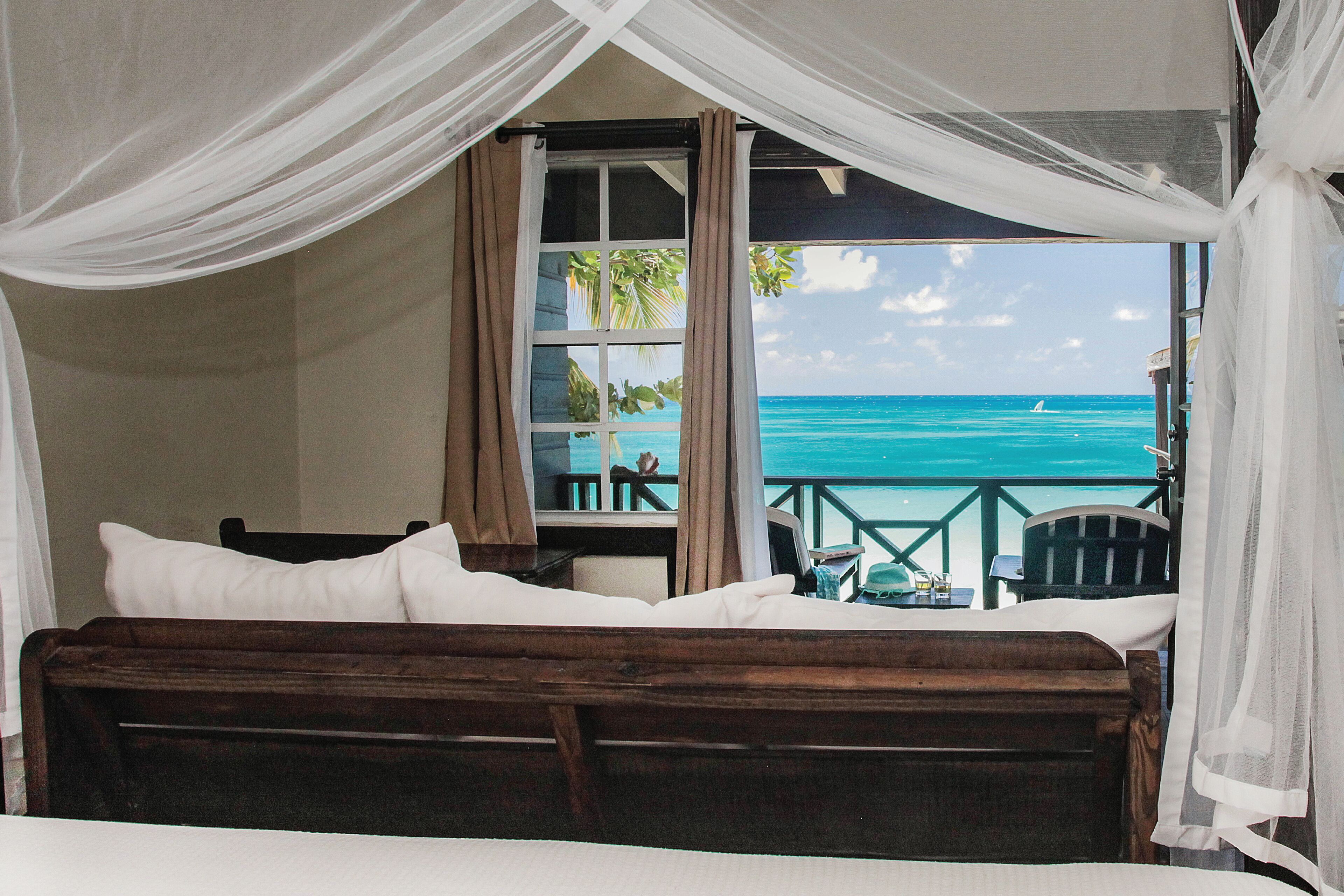 Habitación estándar, balcón, vista a la playa | Ropa de cama de alta calidad y camas con pillow-top 