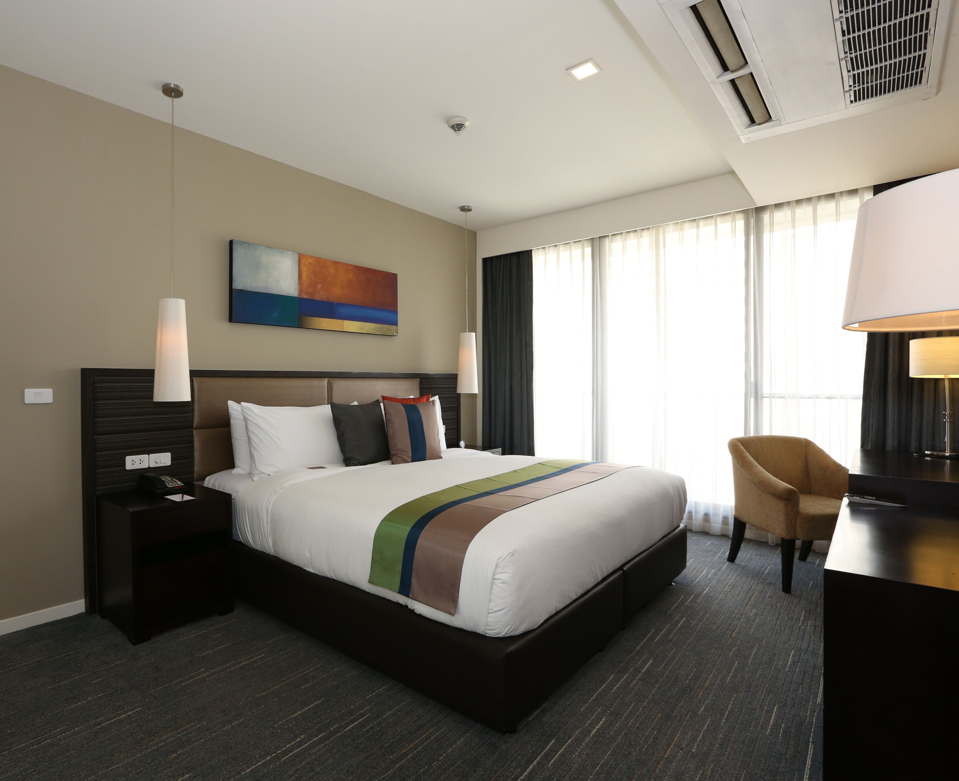 Down duvets, pillow-top beds, in-room safe, desk