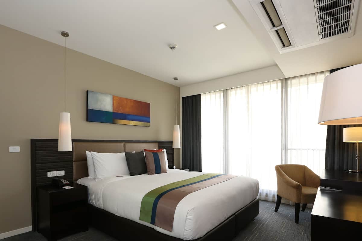 Down comforters, pillowtop beds, in-room safe, desk