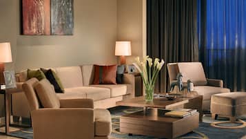 Three Bedroom Deluxe | Living area | 32-inch LCD TV with satellite channels, TV, DVD player