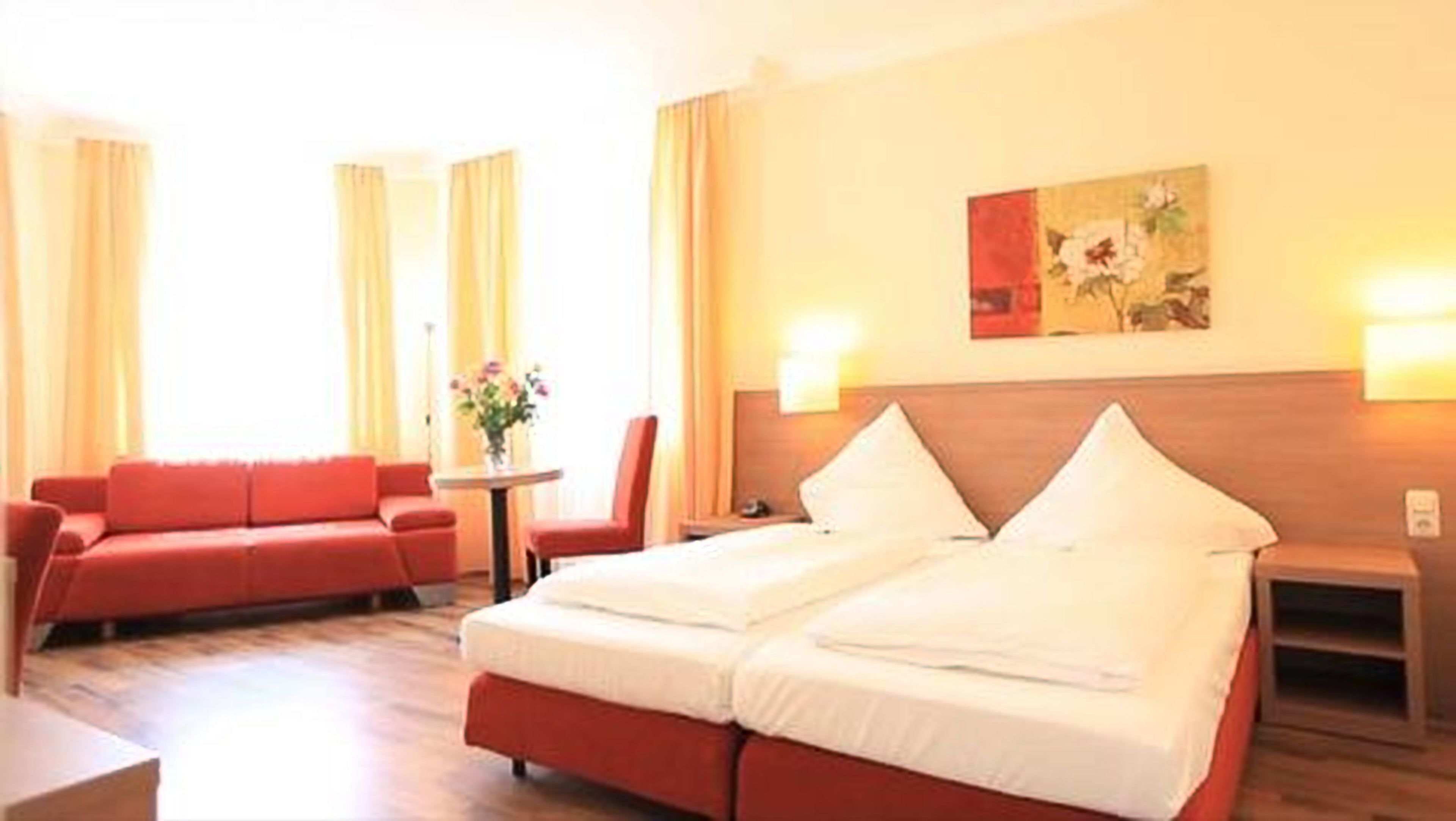 Hypo-allergenic bedding, desk, iron/ironing board, rollaway beds