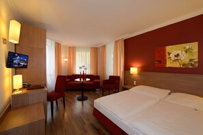 Hypo-allergenic bedding, desk, iron/ironing board, rollaway beds