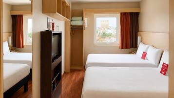 Blackout drapes, soundproofing, free WiFi, bed sheets