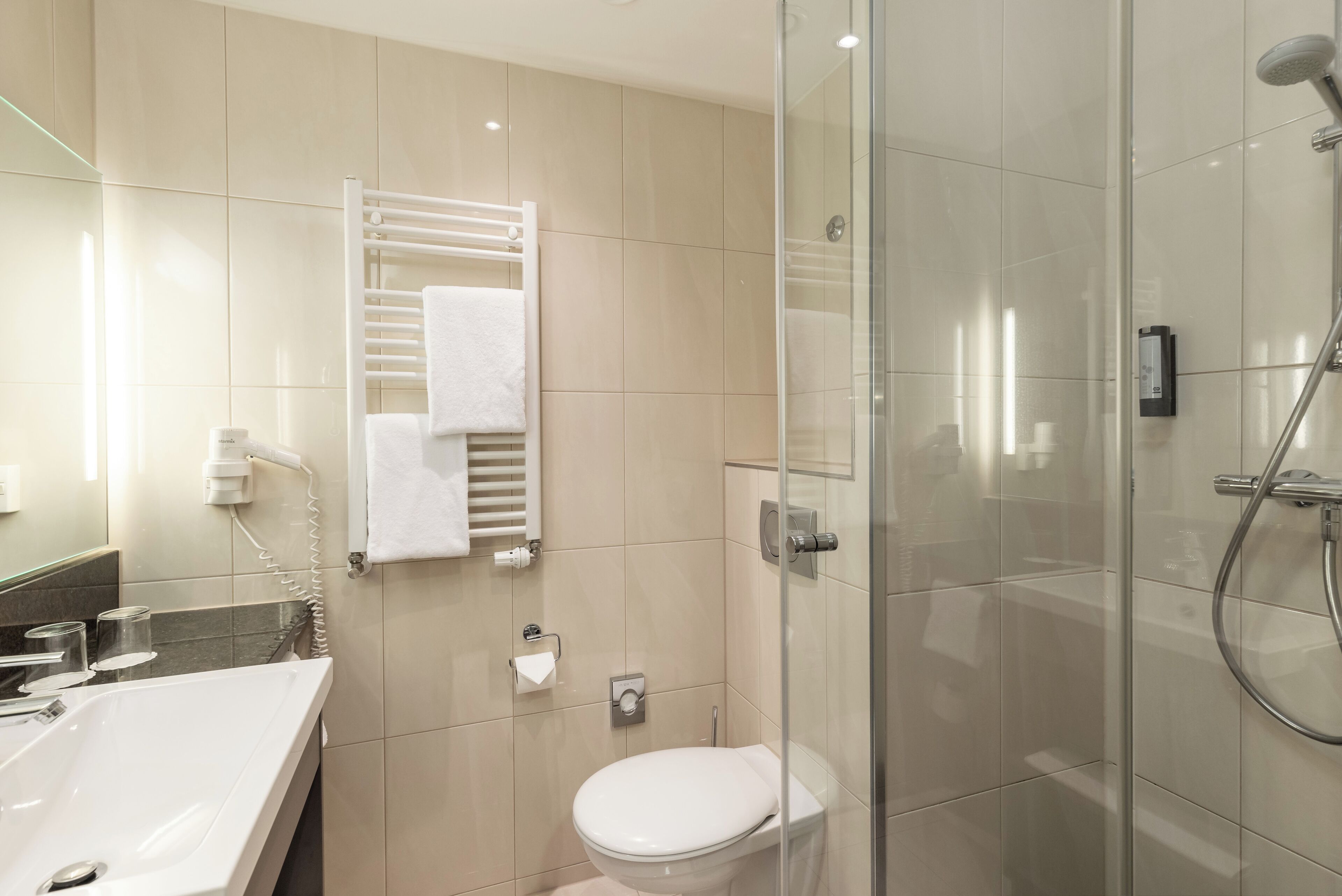 shower, eco-friendly toiletries, hair dryer, towels