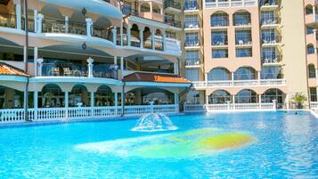 Outdoor pool, pool umbrellas, pool loungers