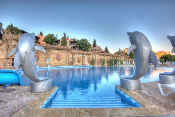 Outdoor pool, pool umbrellas, pool loungers