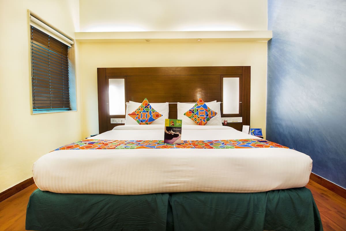 Deluxe Room | Premium bedding, minibar, in-room safe, individually decorated
