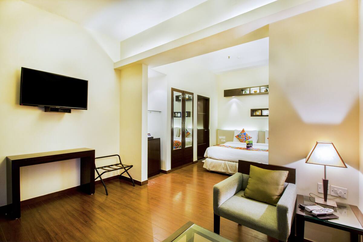 Suite, 1 cama King size | Ropa de cama de alta calidad y minibar