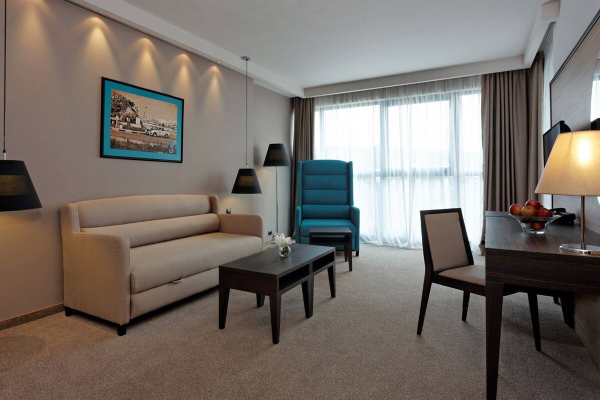 economy double room | living area | lcd tv