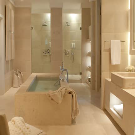 Combined shower/tub, deep soaking tub, free toiletries, slippers