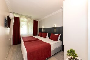 Lençóis italianos Frette, camas com colchões pillow-top, frigobar