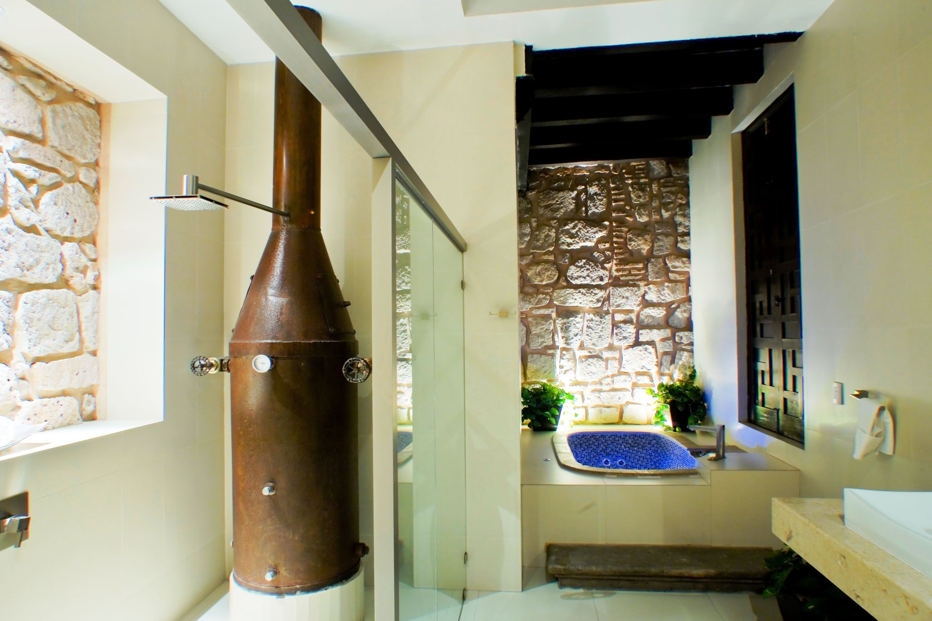 separate bathtub and shower, designer toiletries, hair dryer, bathrobes