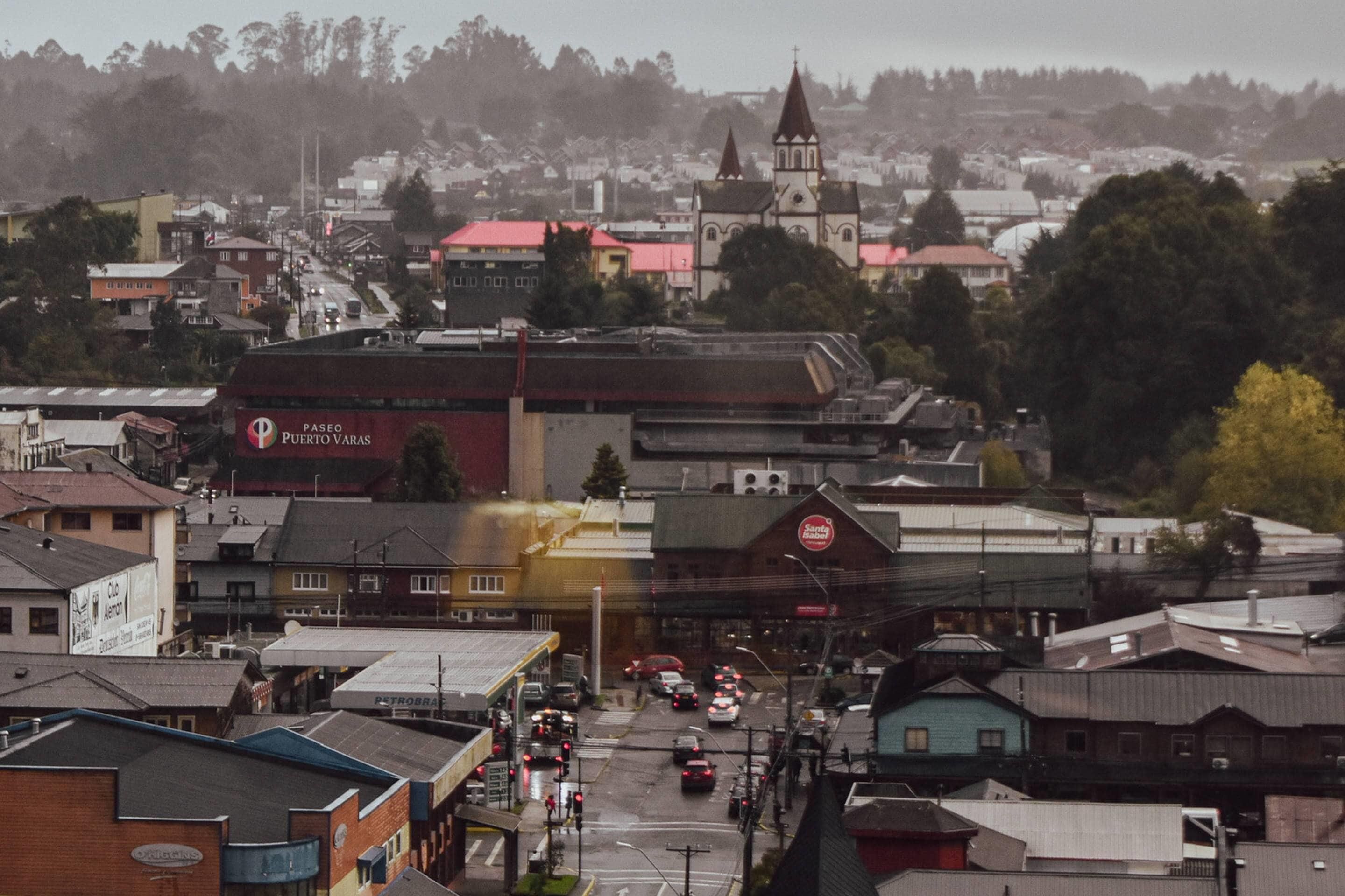 A town with buildings, a church, and a street.
