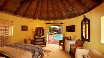 Luxury Poolside Chalet | Minibar, in-room safe, desk, iron/ironing board