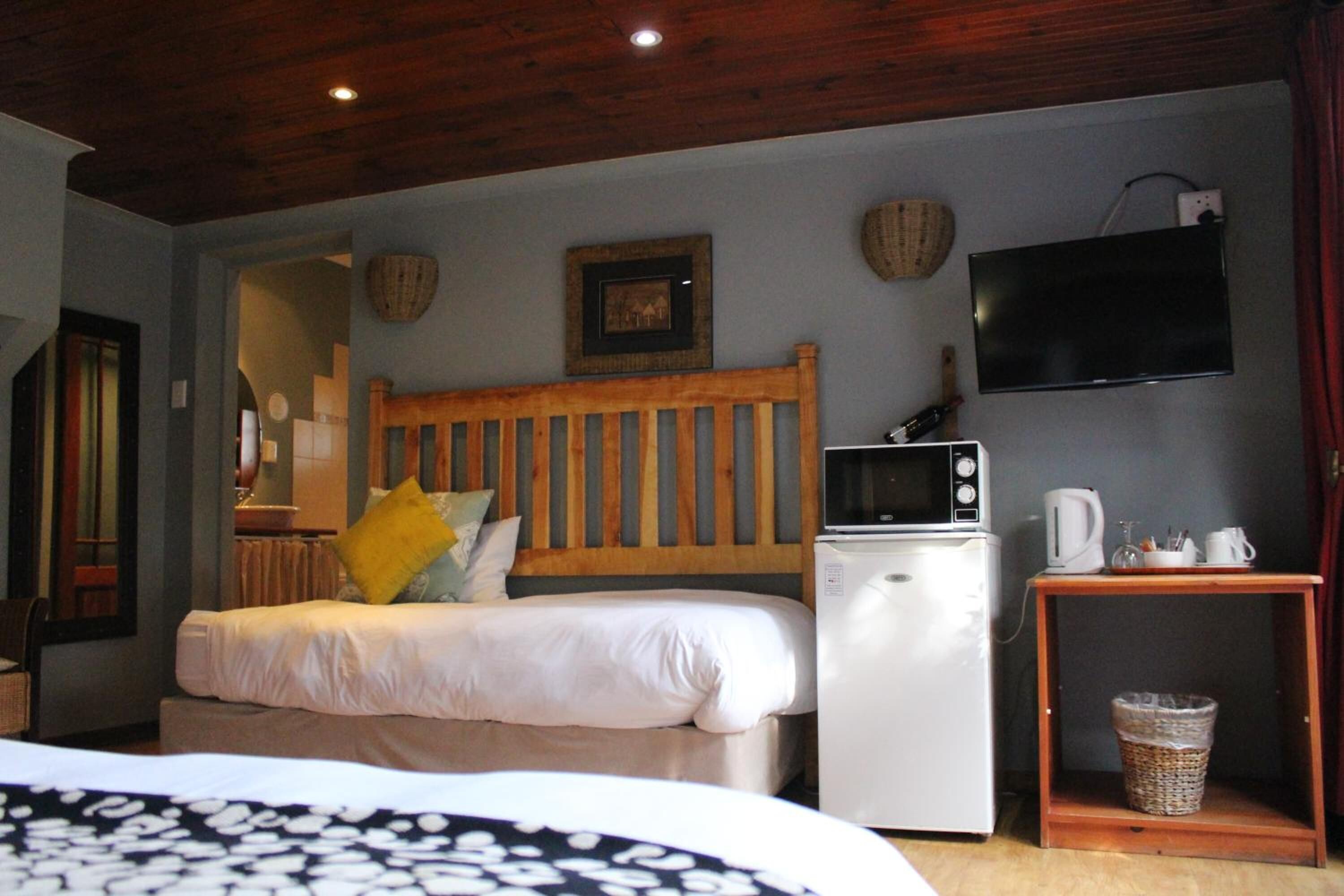 family poolside room c | minibar, in-room safe, desk, iron/ironing board