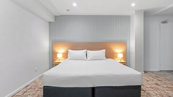 Habitación cuádruple superior | Cortinas blackout, tabla de planchar con plancha y wifi gratis