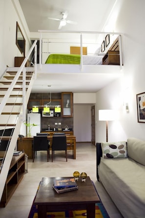 Deluxe Duplex Quadruple | Living room | 32-inch flat-screen TV with cable channels, LCD TV, DVD player