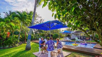 Outdoor pool, open 8:00 AM to 10:00 PM, pool umbrellas, pool loungers