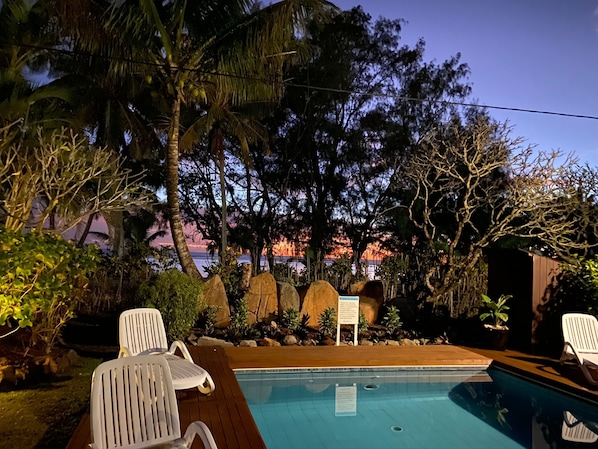 Outdoor pool, open 8:00 AM to 10:00 PM, pool umbrellas, pool loungers