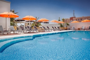 Seasonal outdoor pool, pool umbrellas, sun loungers