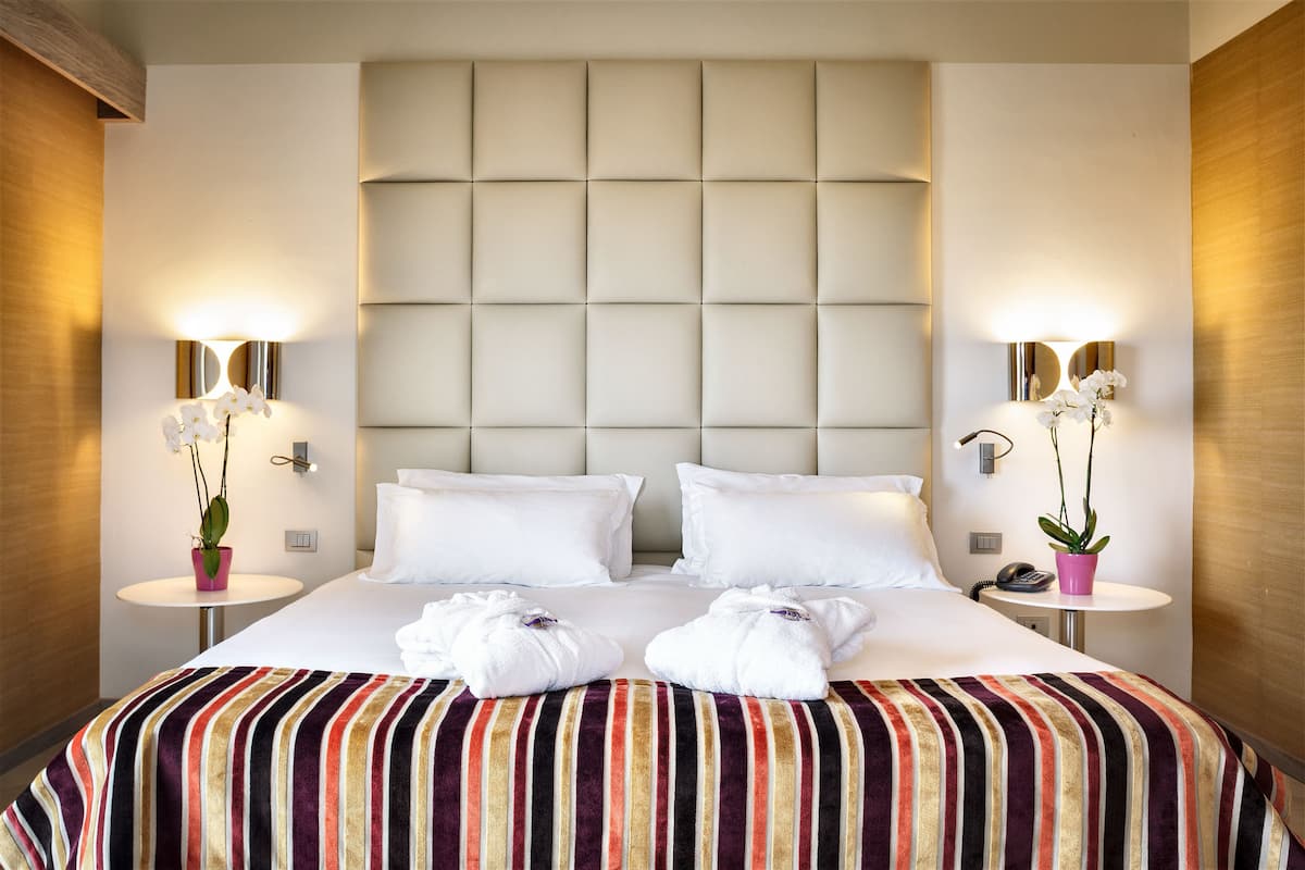 suite | premium bedding, minibar, in-room safe, individually decorated