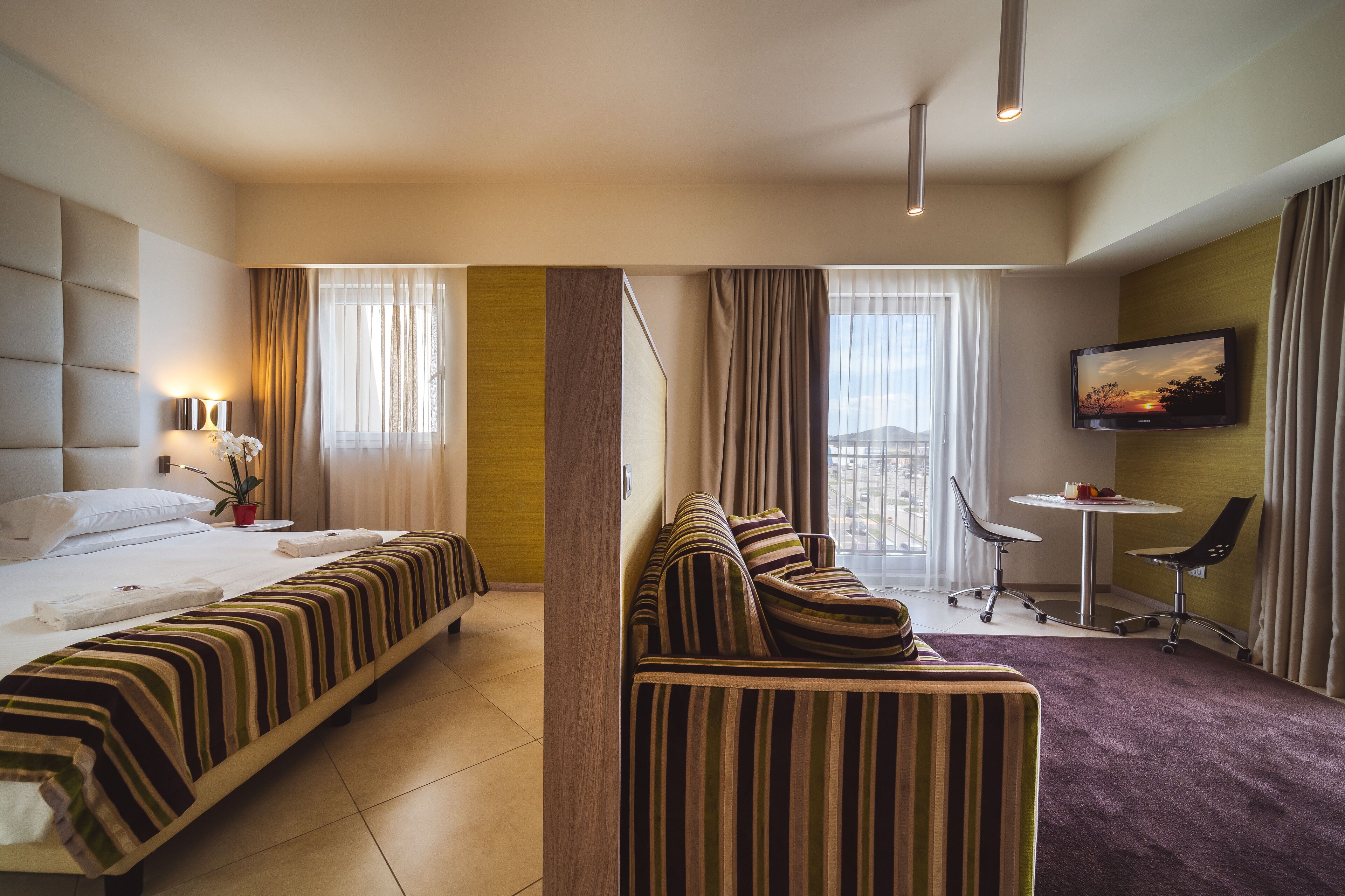 suite | premium bedding, minibar, in-room safe, individually decorated