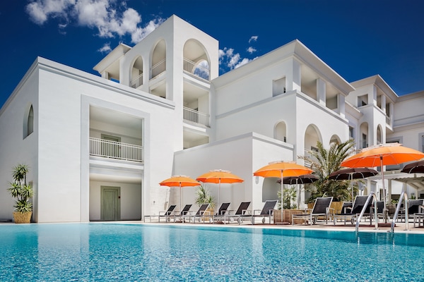 Seasonal outdoor pool, pool umbrellas, pool loungers