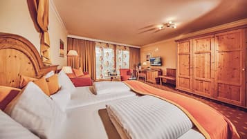 Deluxe Family Room | In-room safe, individually decorated, individually furnished, desk