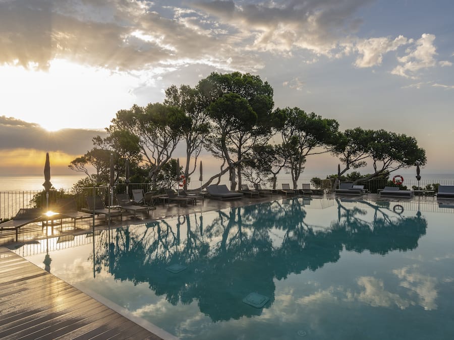 Seasonal outdoor pool, pool umbrellas, pool loungers