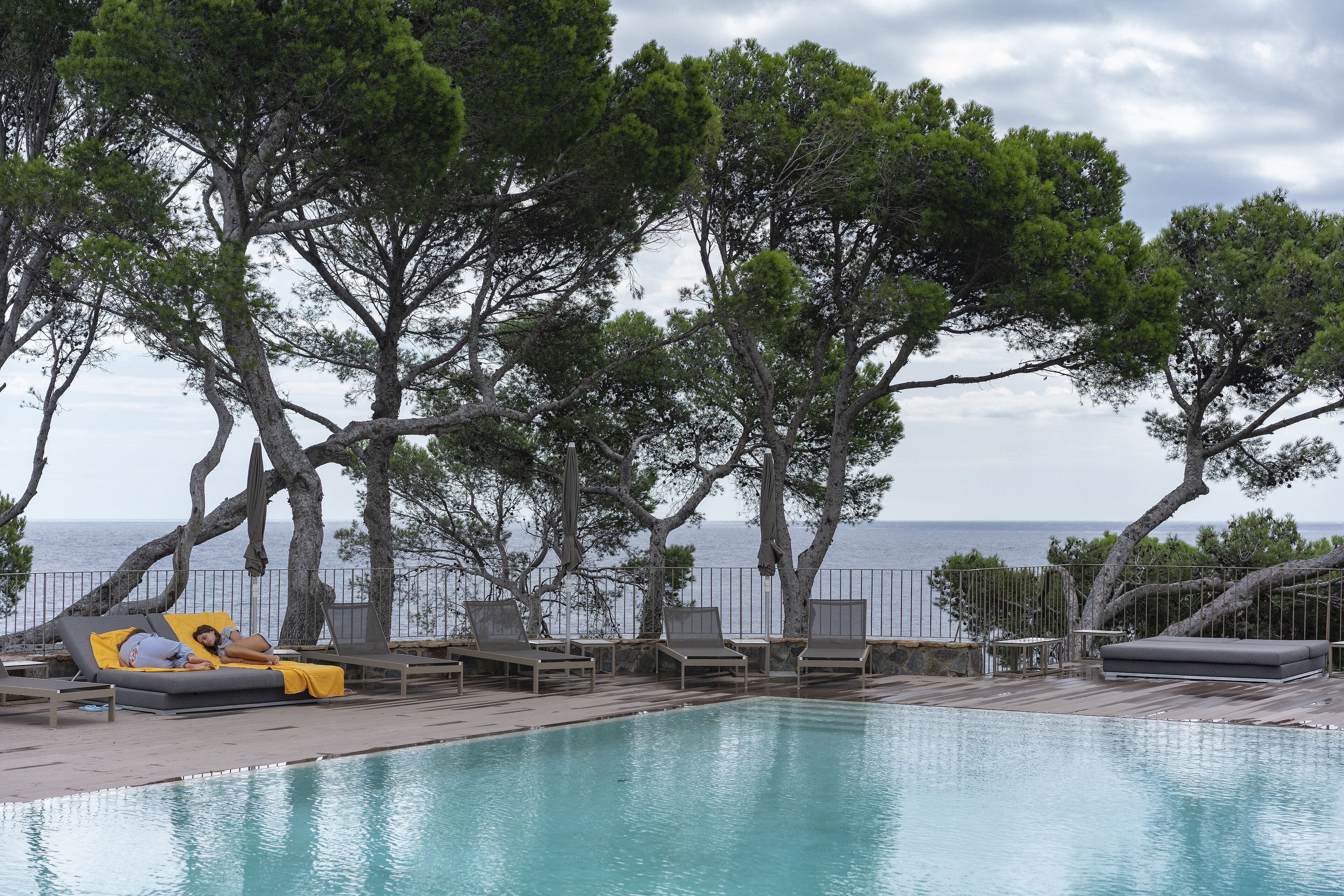 seasonal outdoor pool, pool umbrellas, pool loungers