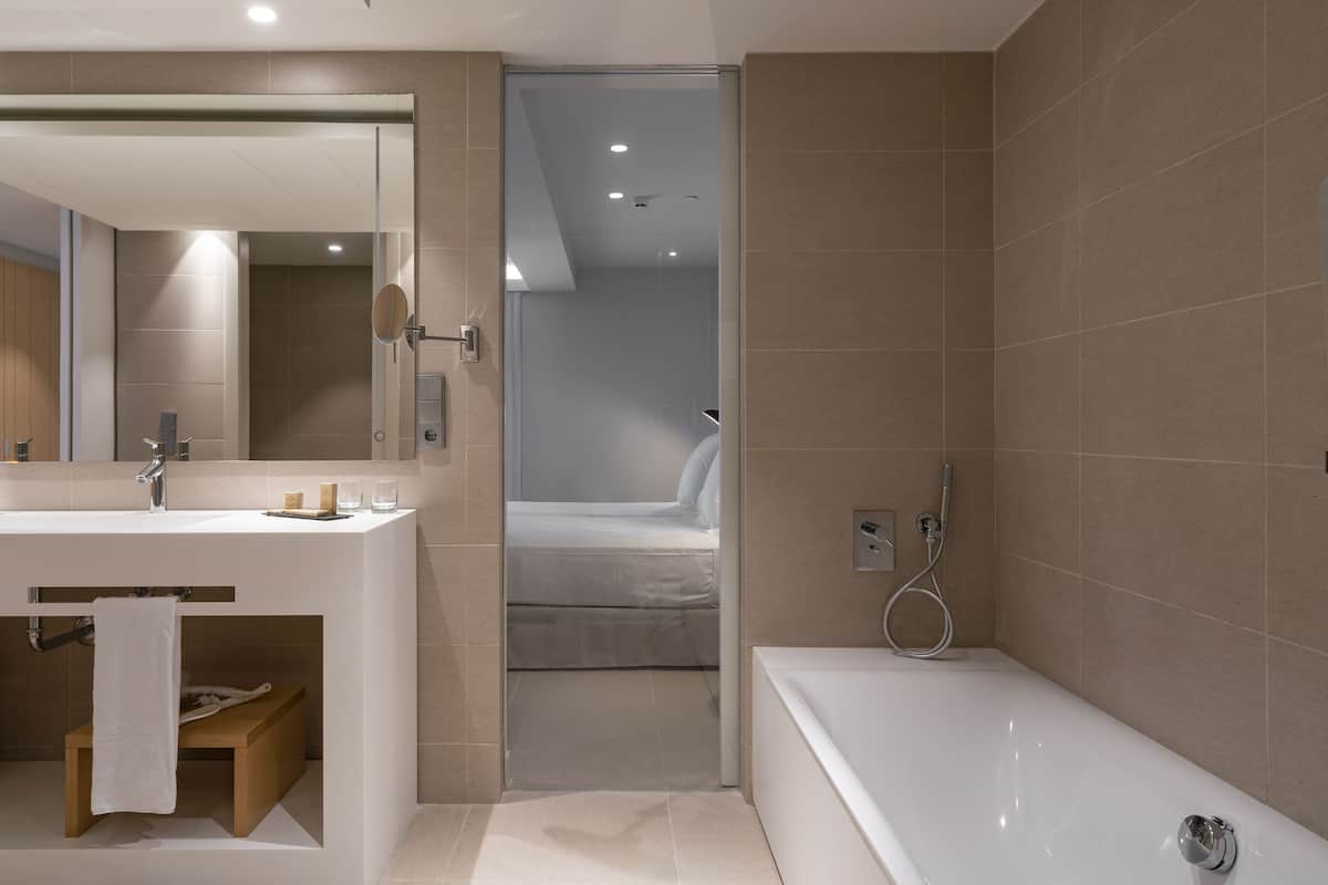 superior double room | bathroom | eco-friendly toiletries, hair dryer, towels, soap