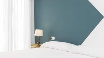 Planxa i posts de planxar, bressols, wifi gratuïta i roba de llit