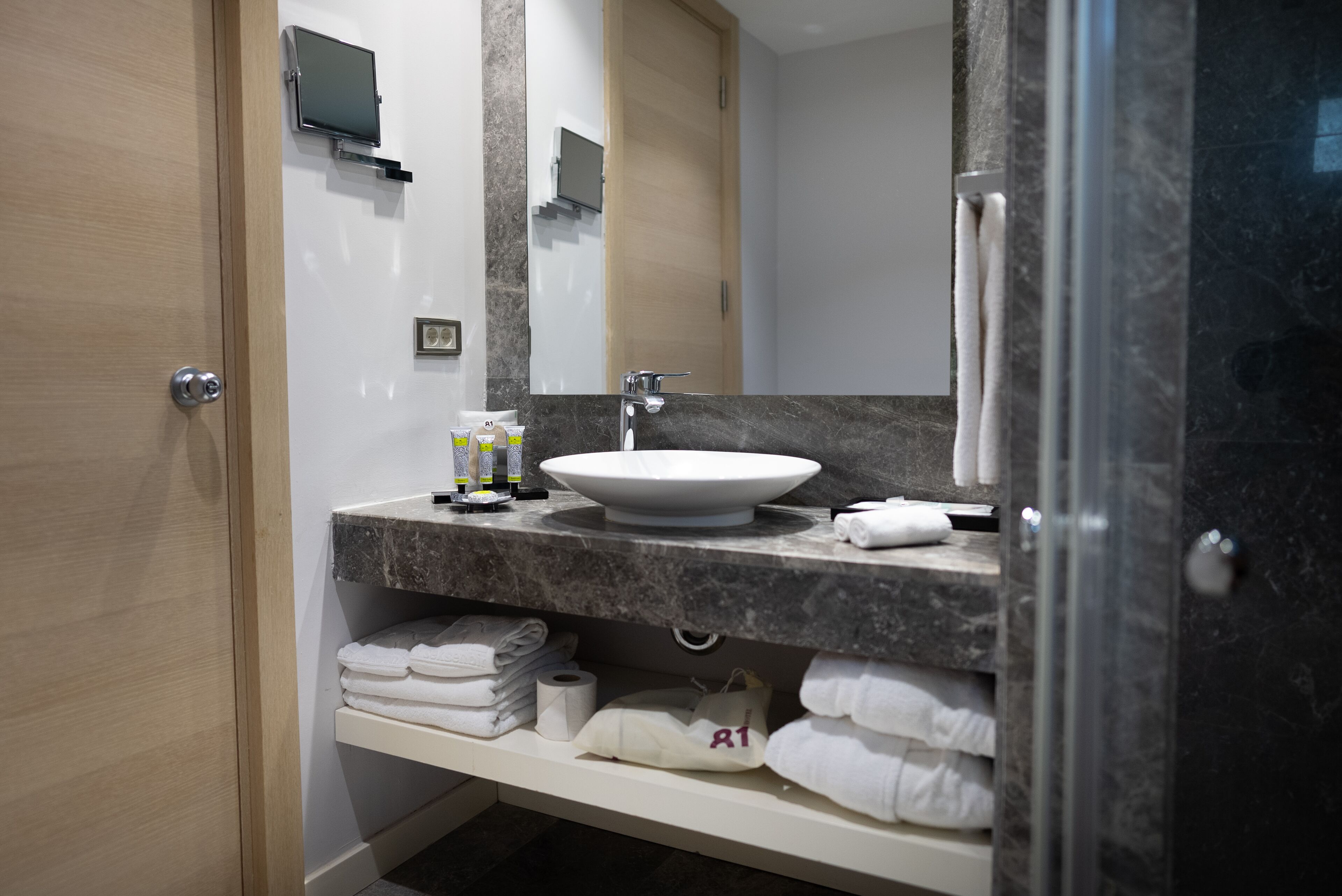 beachfront garden view room | bathroom | shower, designer toiletries, hair dryer, bathrobes
