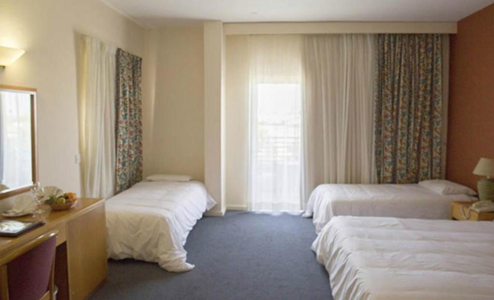 desk, blackout curtains, iron/ironing board, free wifi