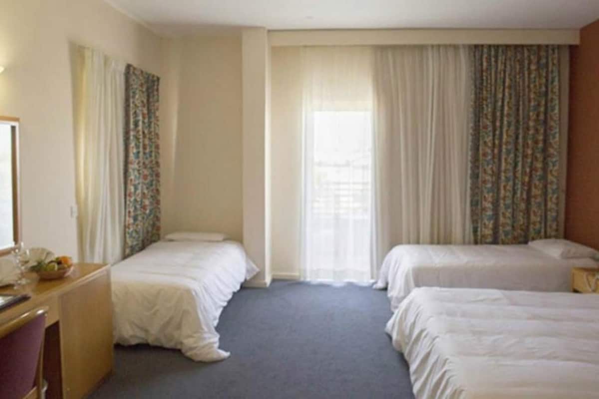 desk, blackout curtains, iron/ironing board, free wifi