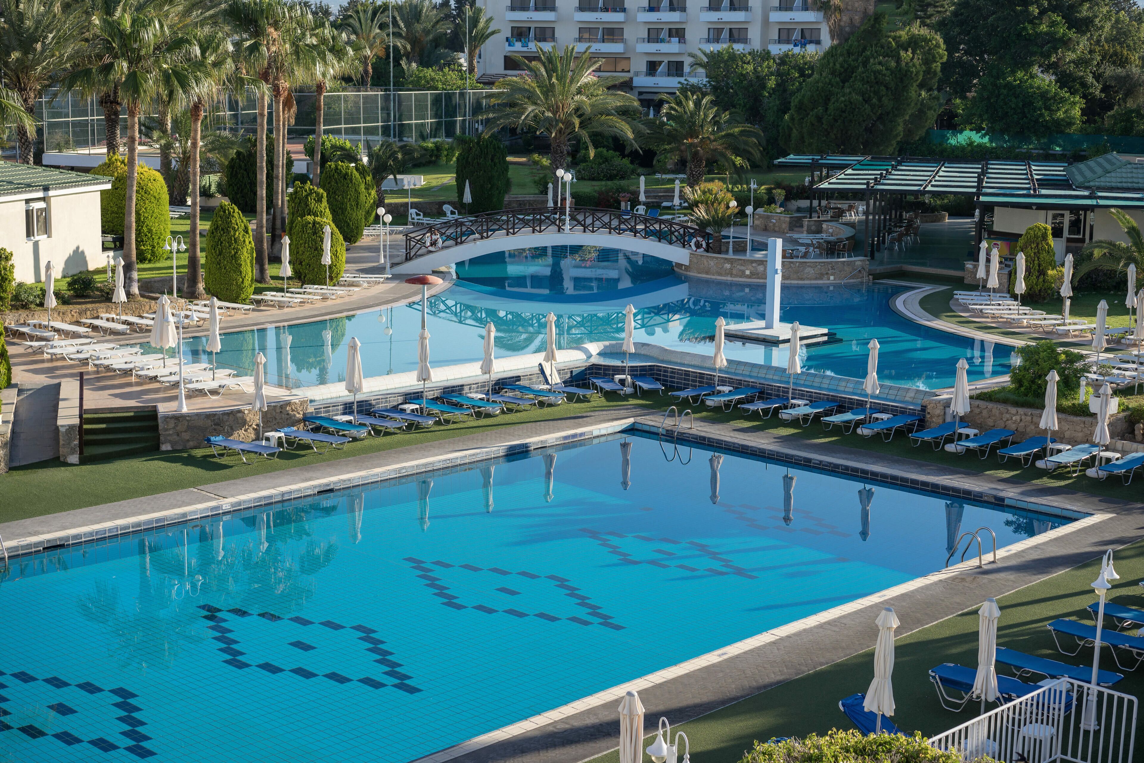 indoor pool, 2 outdoor pools, pool umbrellas, pool loungers