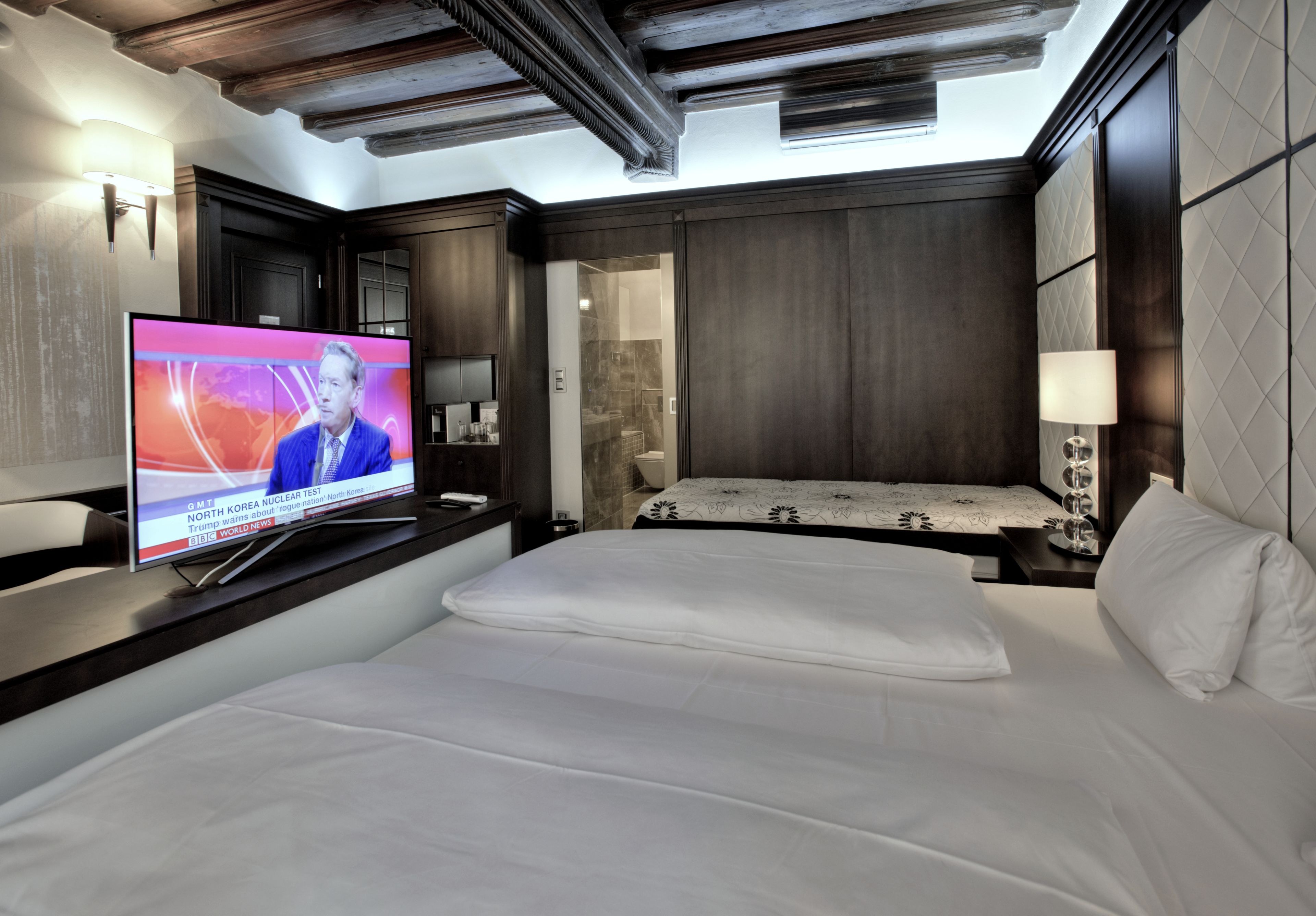 triple room (depandance  - panská street) | minibar, in-room safe, desk, soundproofing