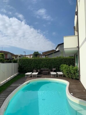 Outdoor pool, pool loungers