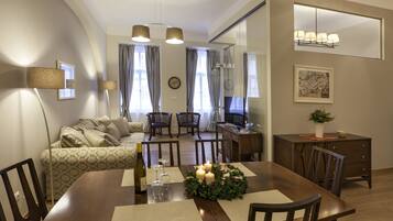 Luxury Studio Suite, 2 Bedrooms, City View | Living area | Flat-screen TV, streaming services