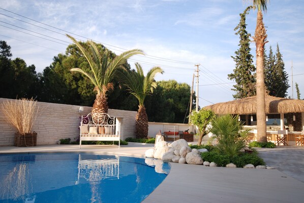 Outdoor pool, pool umbrellas, sun loungers