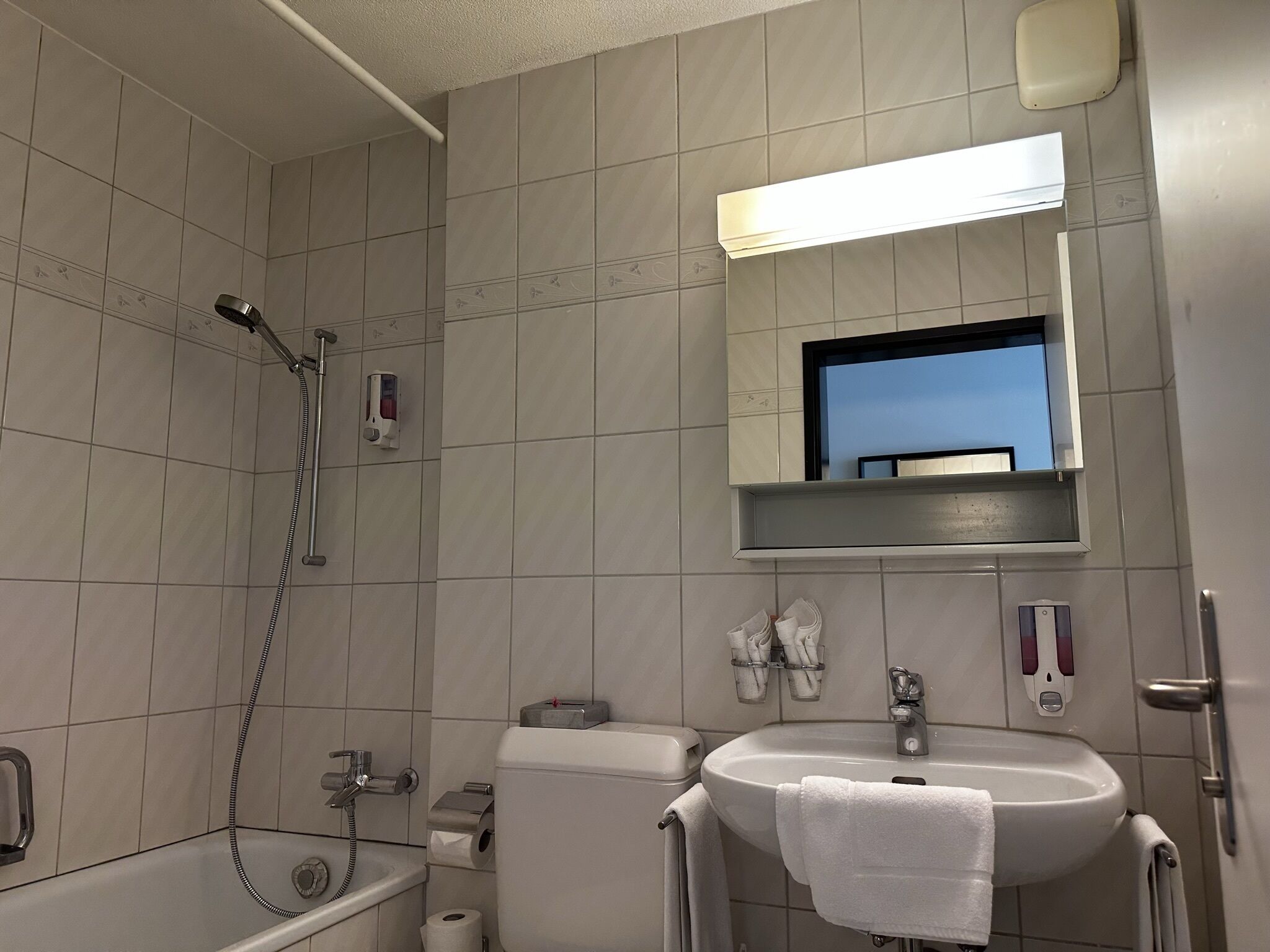 comfort single room | bathroom | hair dryer, towels