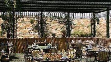 Breakfast, lunch, dinner served; Moroccan cuisine, alfresco dining
