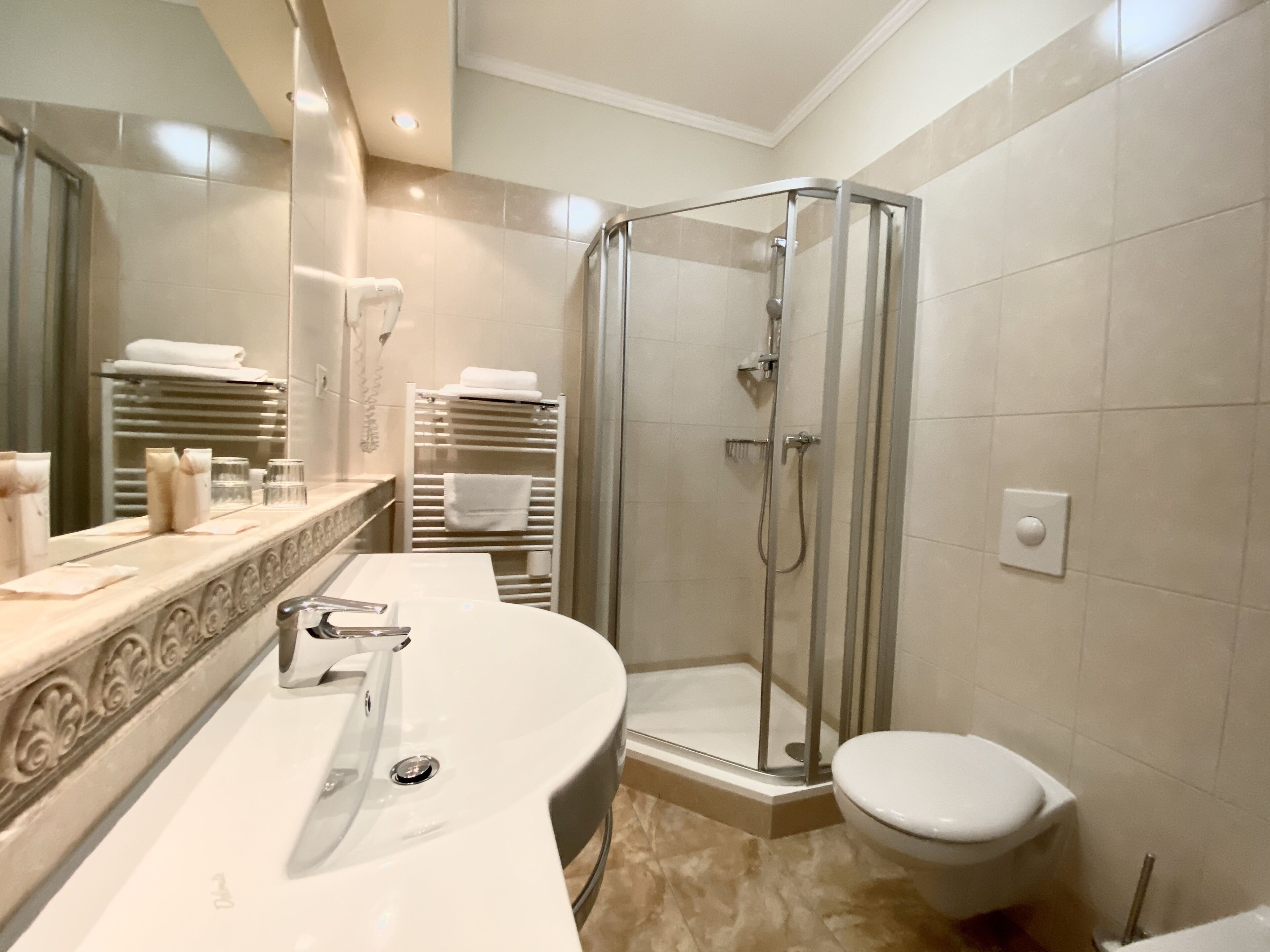 superior twin room | bathroom | free toiletries, hair dryer, towels