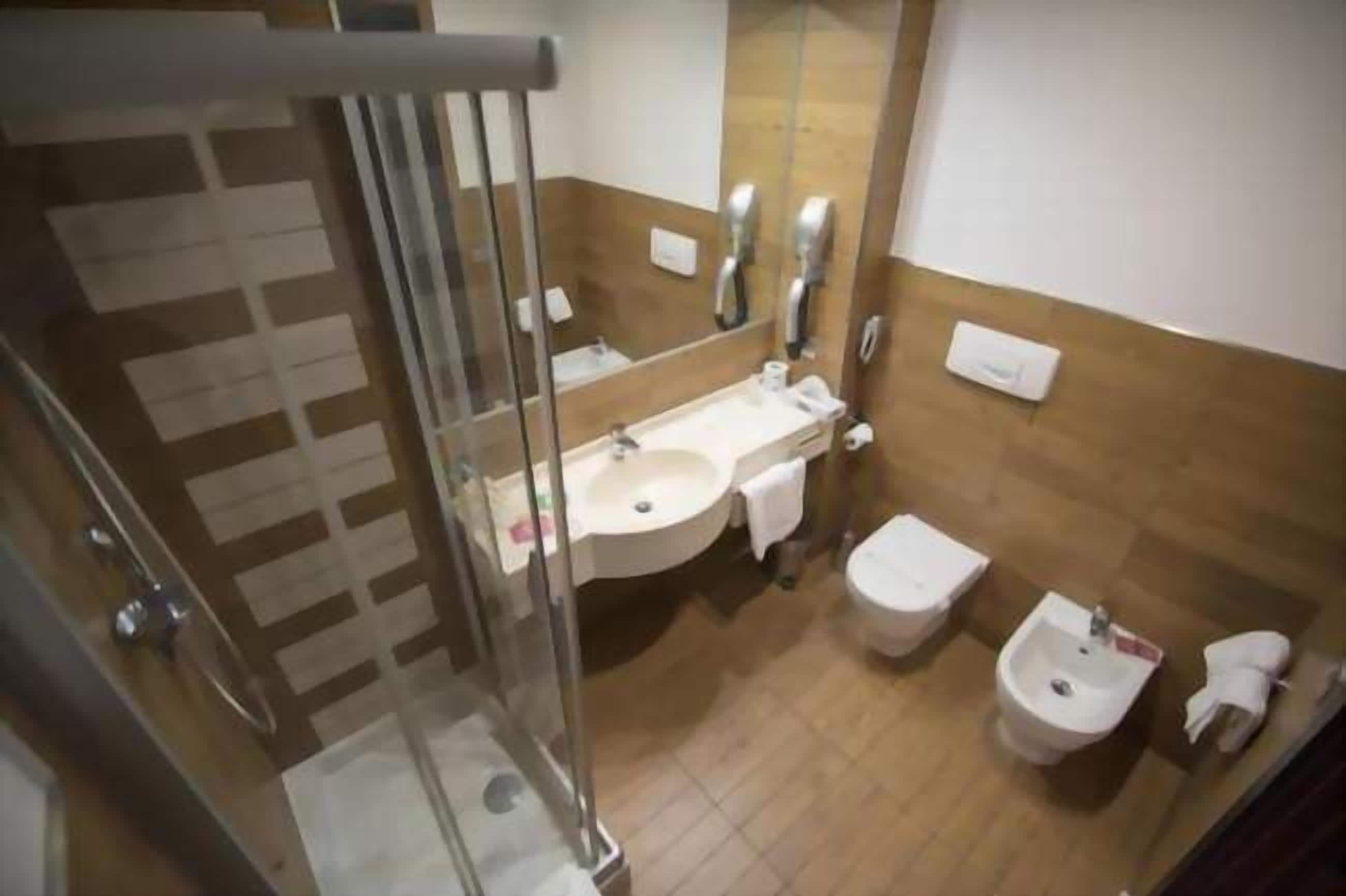 free toiletries, hair dryer, bidet, towels