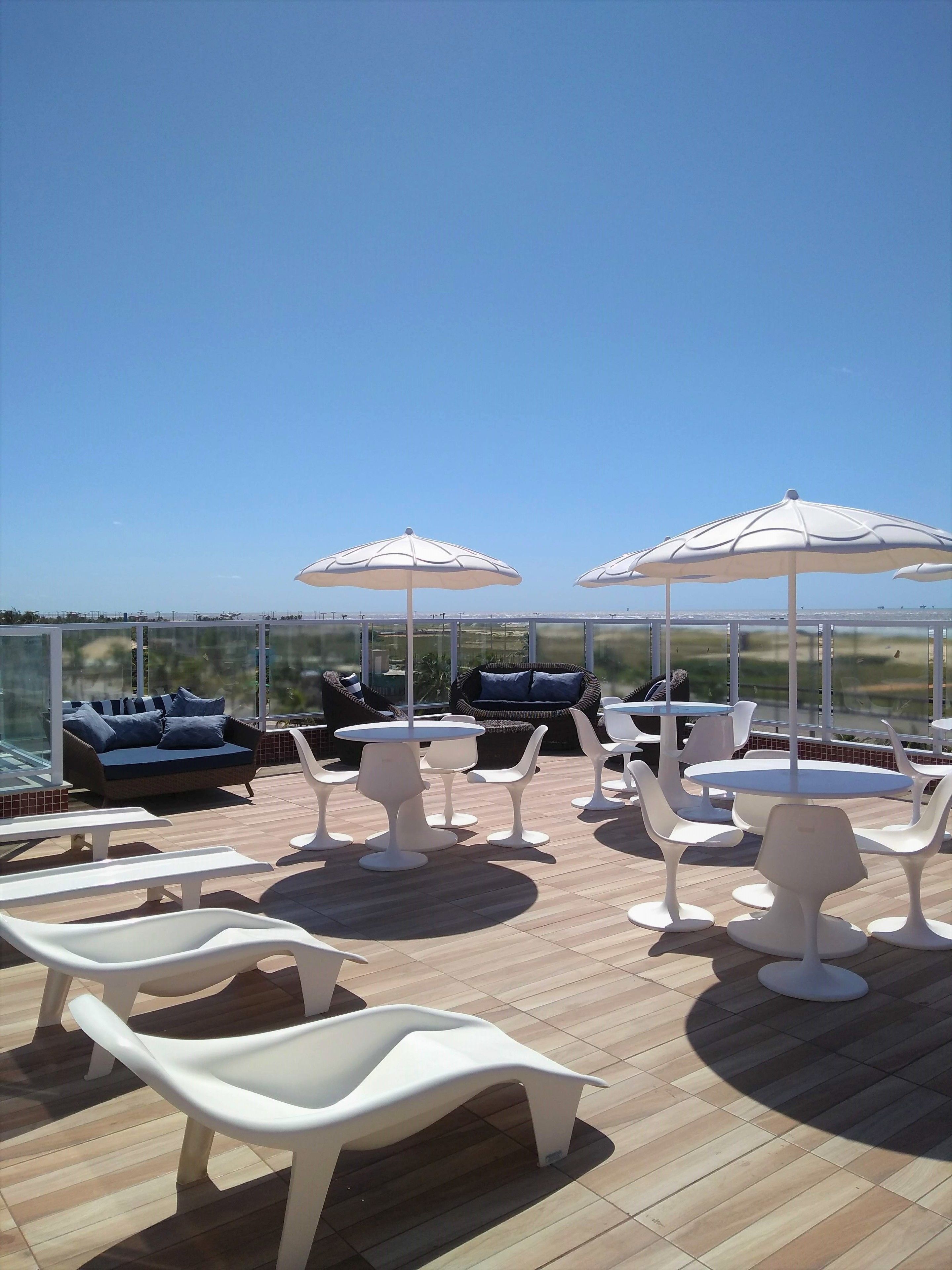 outdoor pool, pool umbrellas, pool loungers