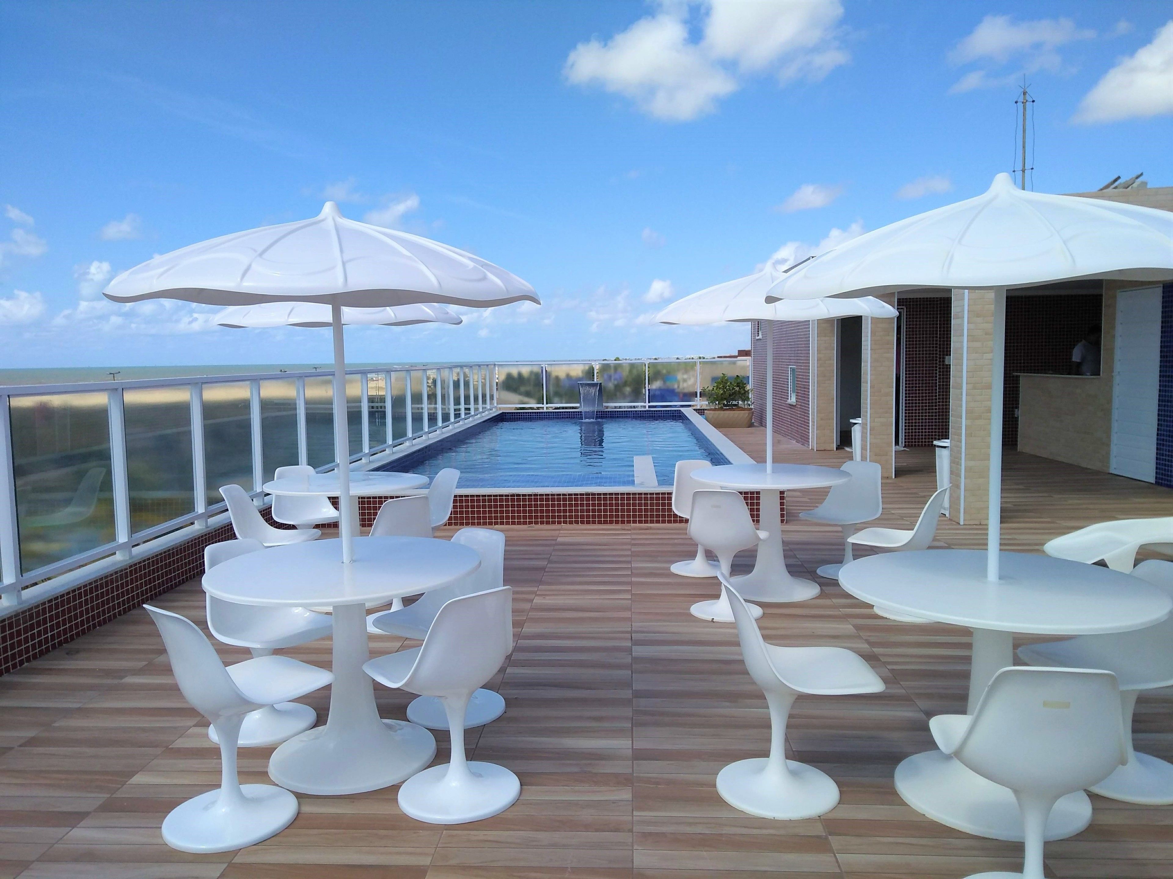 Outdoor pool, pool umbrellas, sun loungers