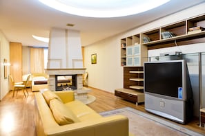 Apartment, 1 Double Bed with Sofa bed, Lanai | Living area | LED TV